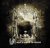 Обложка альбома «Take A Look In The Mirror» (Korn, 2003)