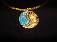 Pendant with opal and gold.jpg