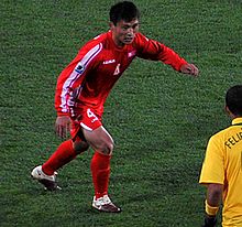 Pak Nam Chol plays with Brasil team. FIFA 2010 World Cup.jpg