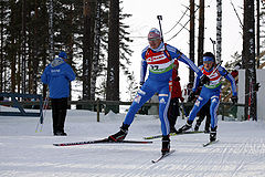 Мужчины, спринт 10 км, суббота 13 марта 2010 года, Контиолахти. Иван Черезов и Максим Чудов на первом круге, соответственно 1-е и 13-е места после финиша.