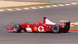 Ferrari F2002 Михаэля Шумахера на Гран-при Франции 2002 года, победа в котором принесла ему 4 чемпионский титул в карьере